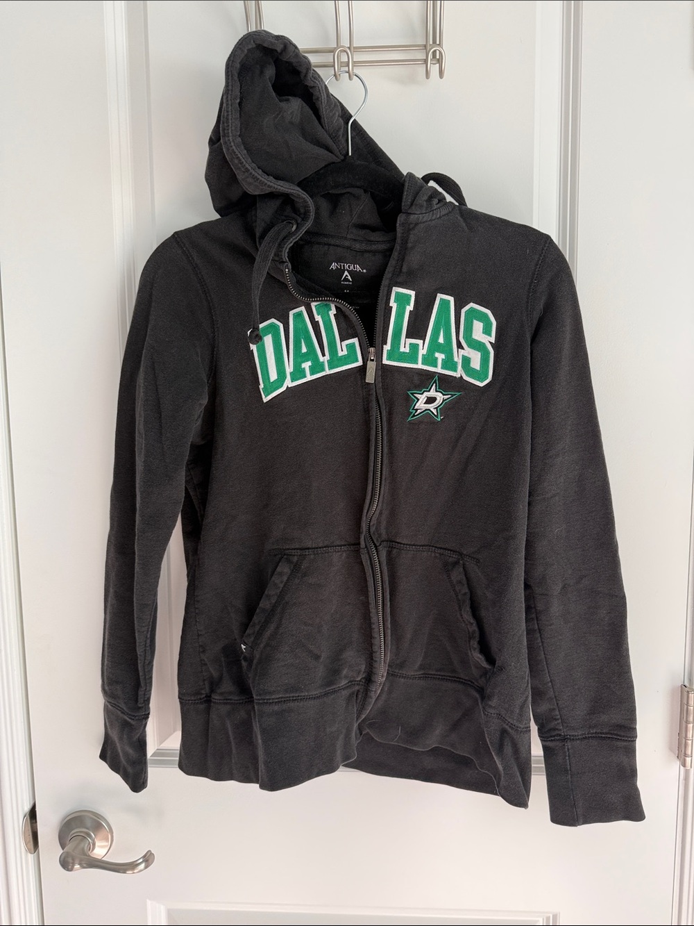 Antigua Black Hoodie with Green and White Dallas Lettering